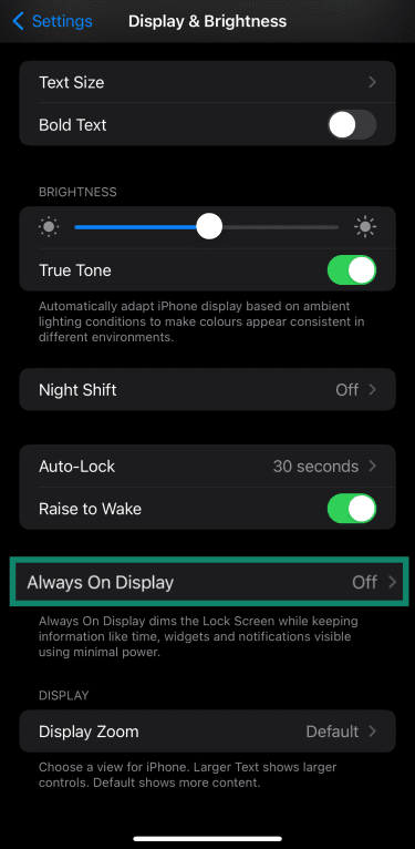 Accessing the Always On Display settings on an iPhone through the Display & Brightness menu