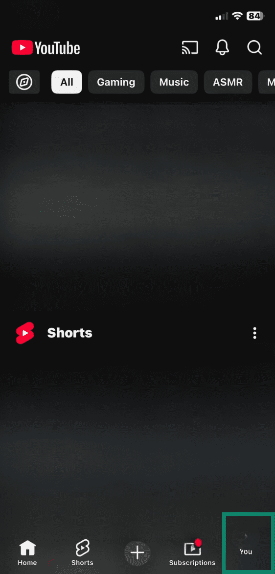 YouTube app open with profile picture icon highlighted
