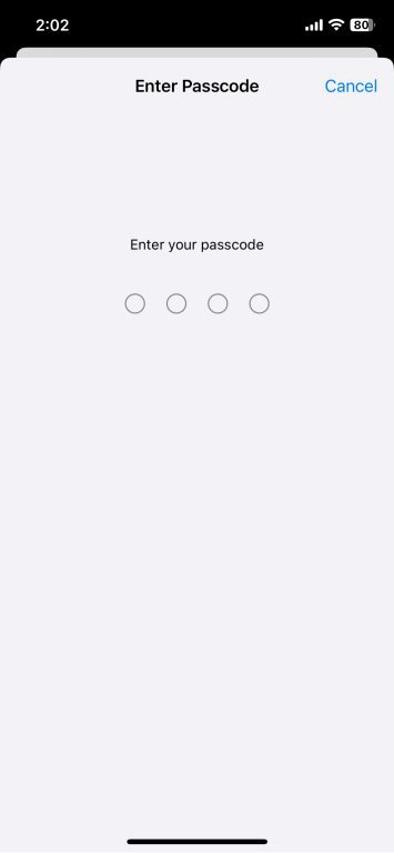 iPhone Enter Passcode interface for a four-digit passcode.